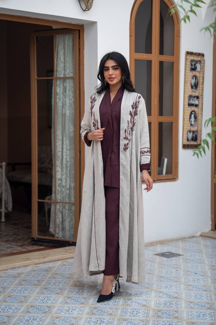 Light beige linen trench coat with embroidery.C:1091