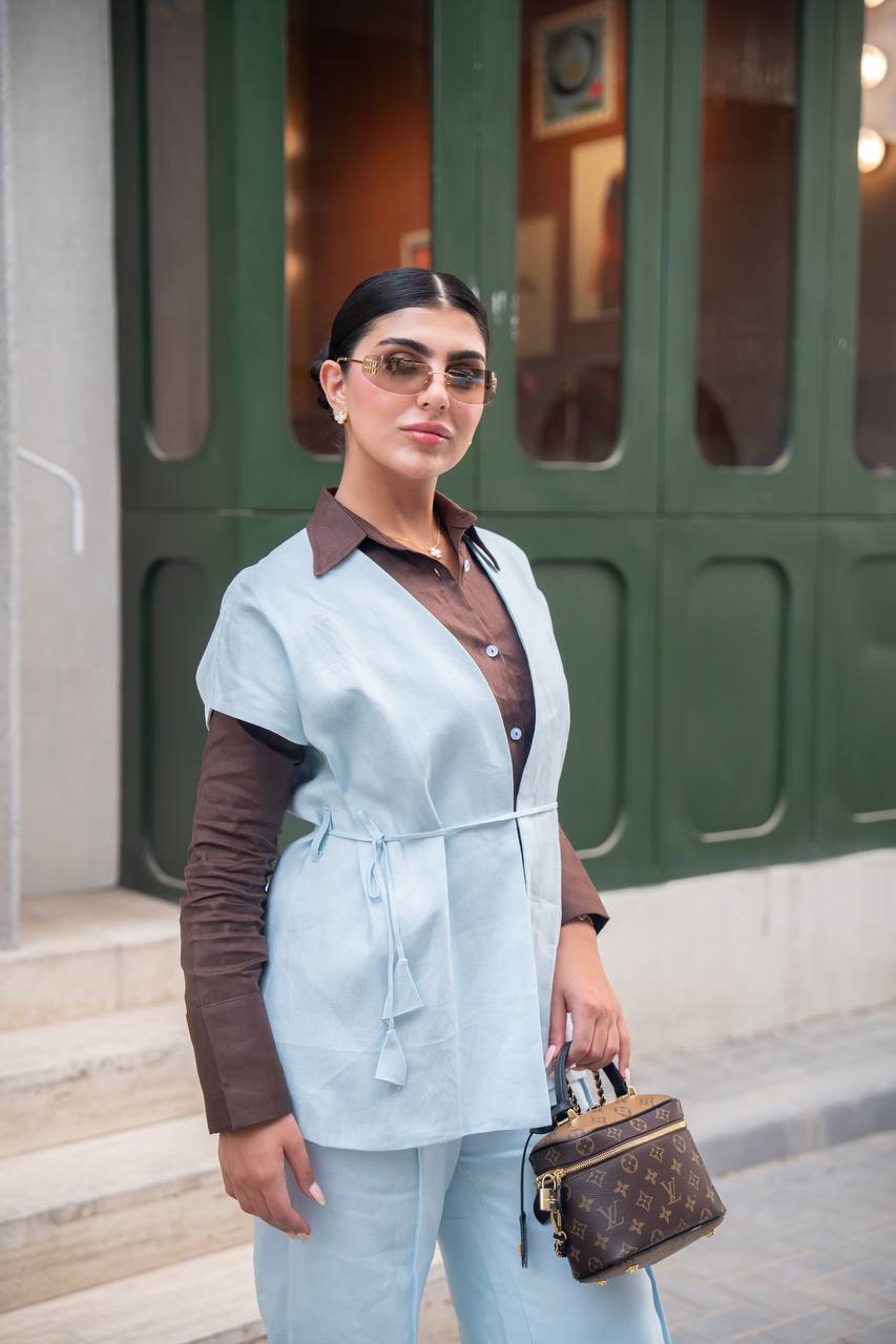 Linen set consisting of a vest and pants in light blue with a brown shirt.C:J1043 Blue