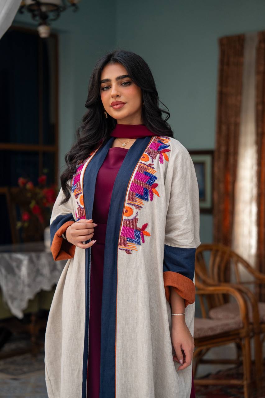 Light beige linen abaya with hand-beading. C:J1079