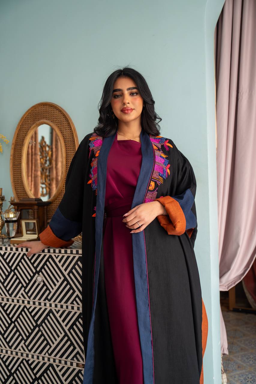 Linen abaya in black with hand embroidery. C:J1080