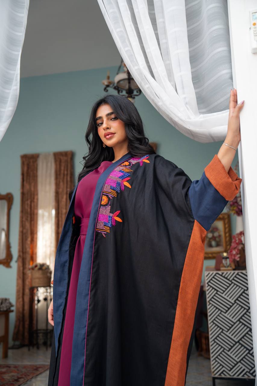 Linen abaya in black with hand embroidery. C:J1080