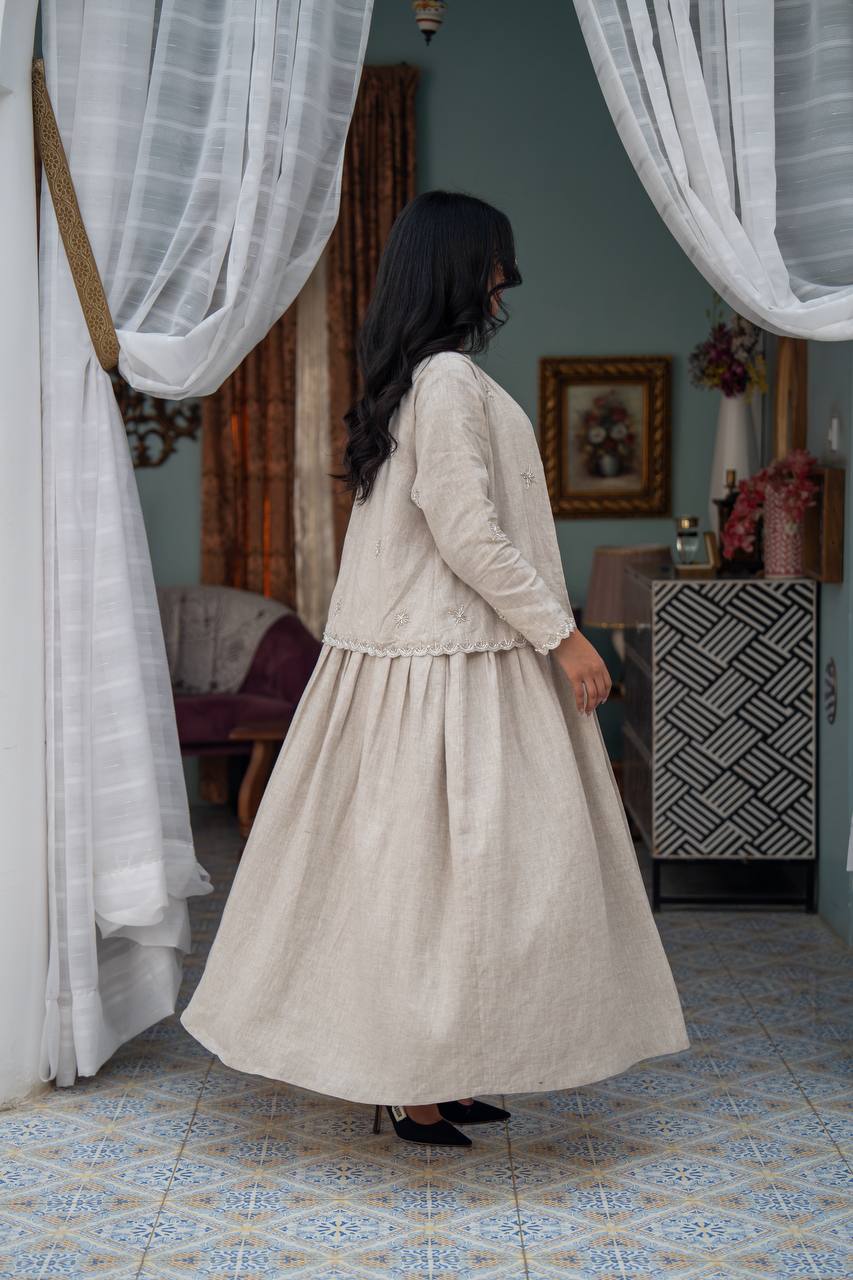 Light beige linen trench coat with hand-stitched detailing.C:J1081