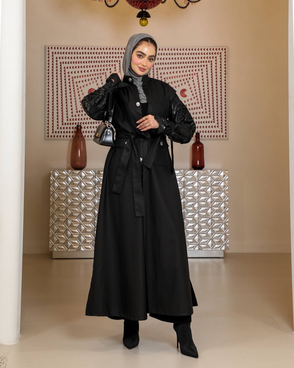 Trench coat with leather on the sleeves. C:J1075