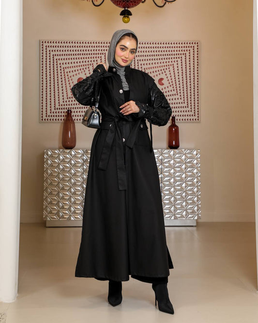 Trench coat with leather on the sleeves. C:J1075