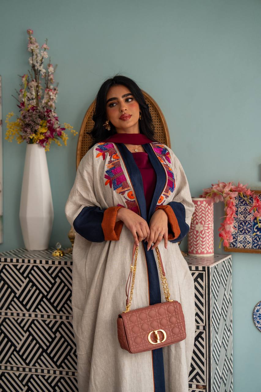 Light beige linen abaya with hand-beading. C:J1079