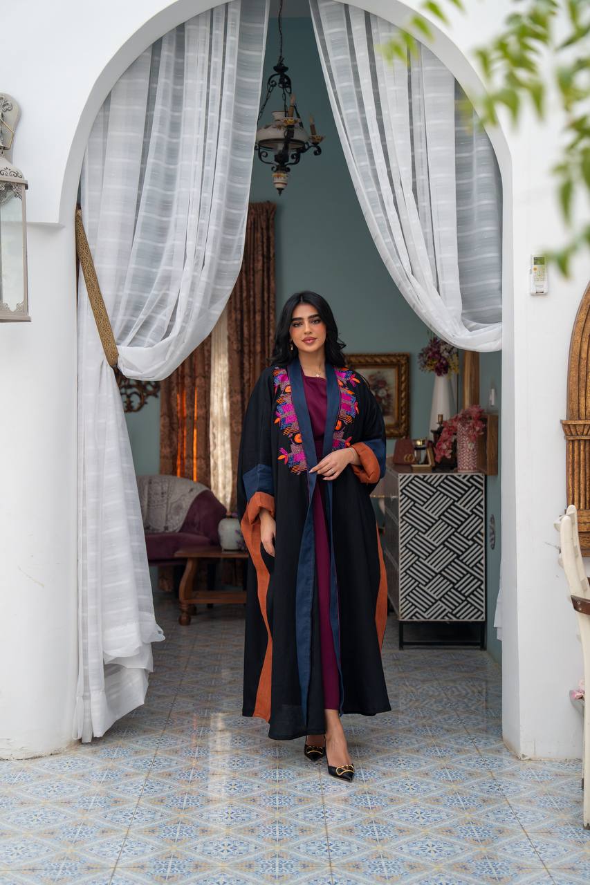 Linen abaya in black with hand embroidery. C:J1080