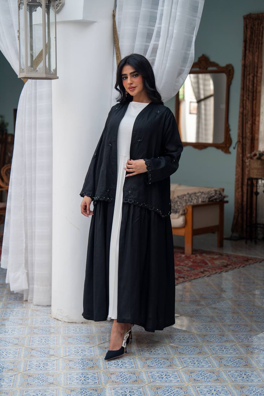 Trench coat linen in black with hand stitching.C:J1081/S