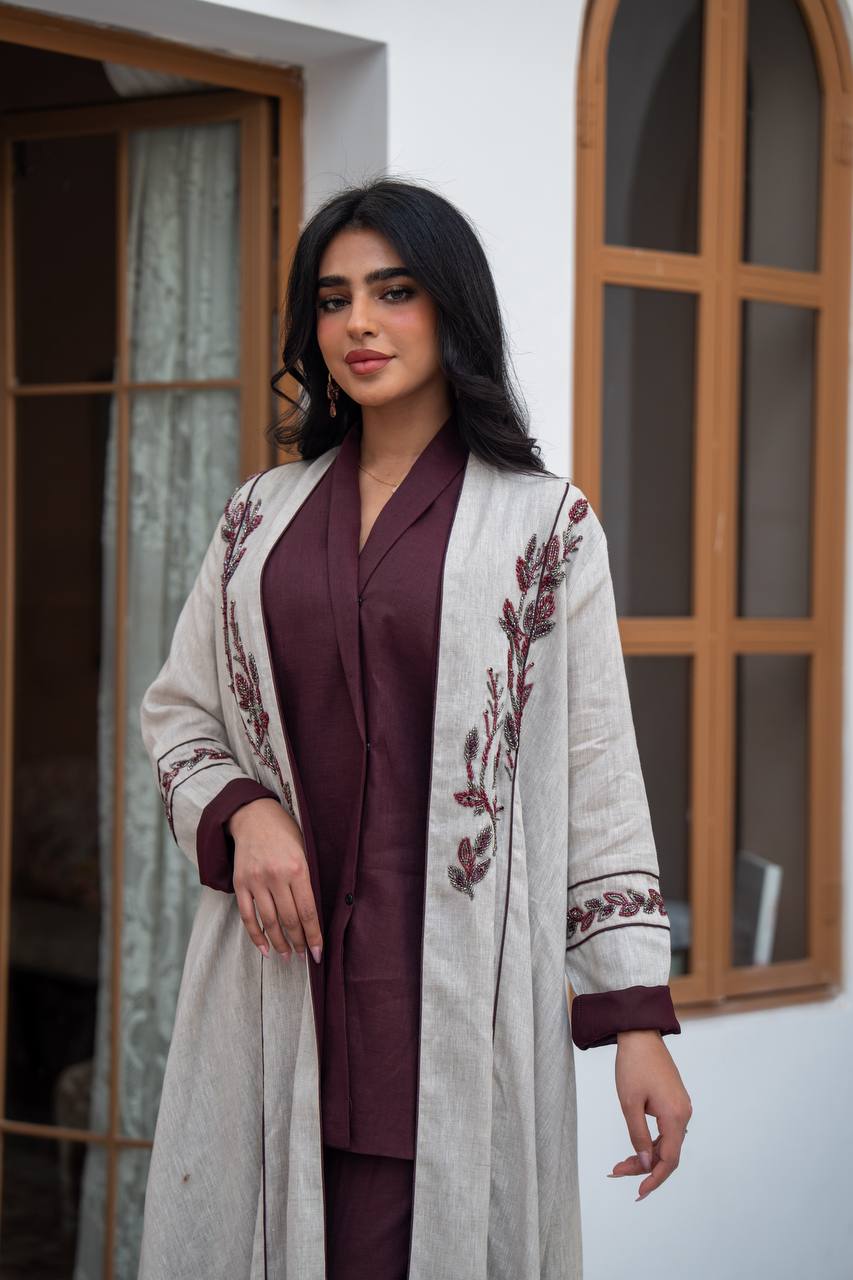 Light beige linen trench coat with embroidery.C:1091
