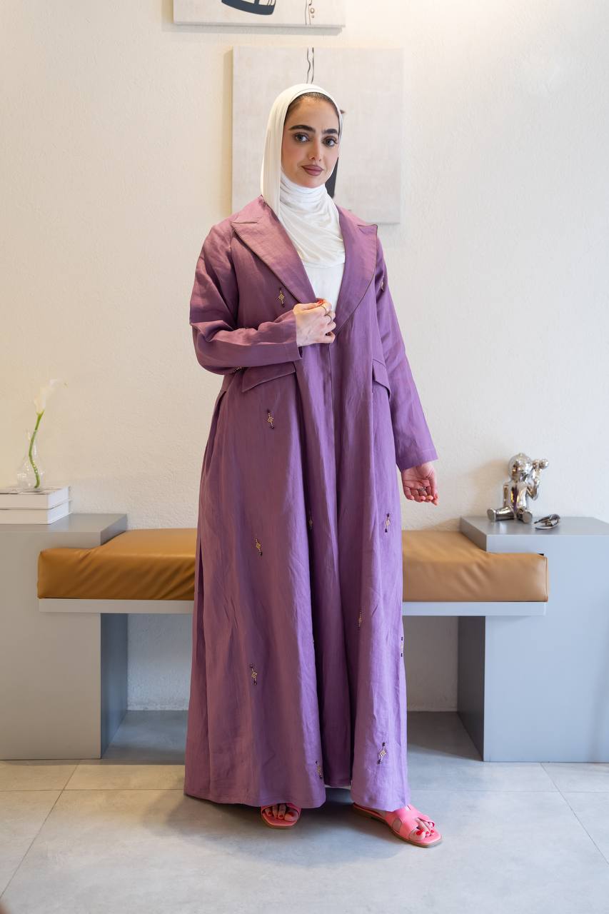 Purple linen trench coat with hand-stitched detailing.C:1096