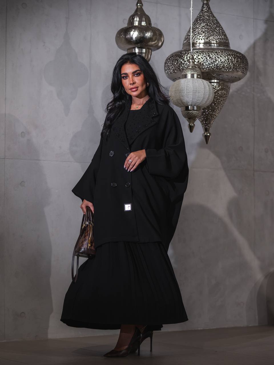 Black crepe skirt and blazer set.C:J6516