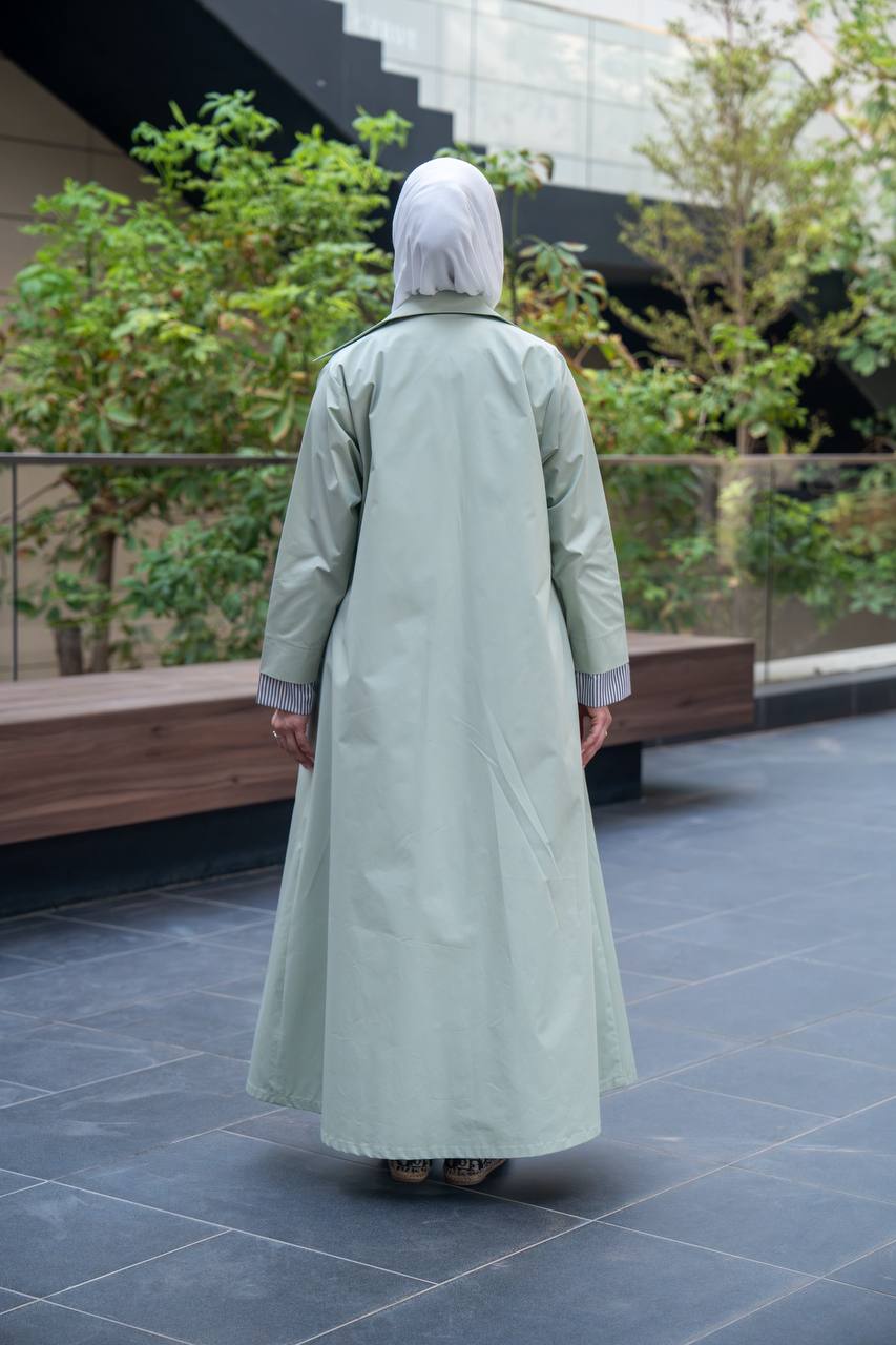 ترنش كوت باللون الفستقي الفاتح مع رمادي مقلم .  C:J1056
