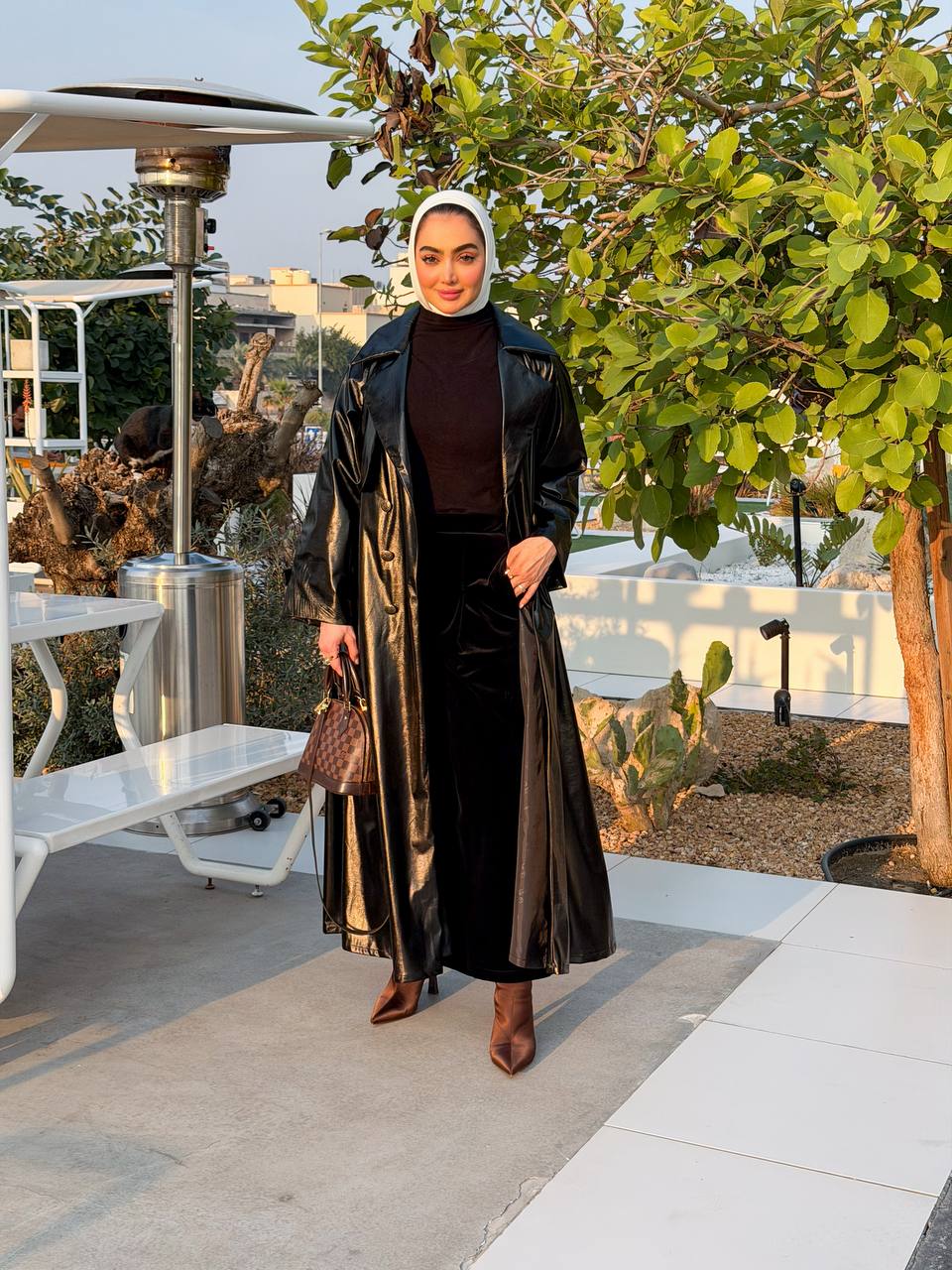 black leather trench coat. C:J1067