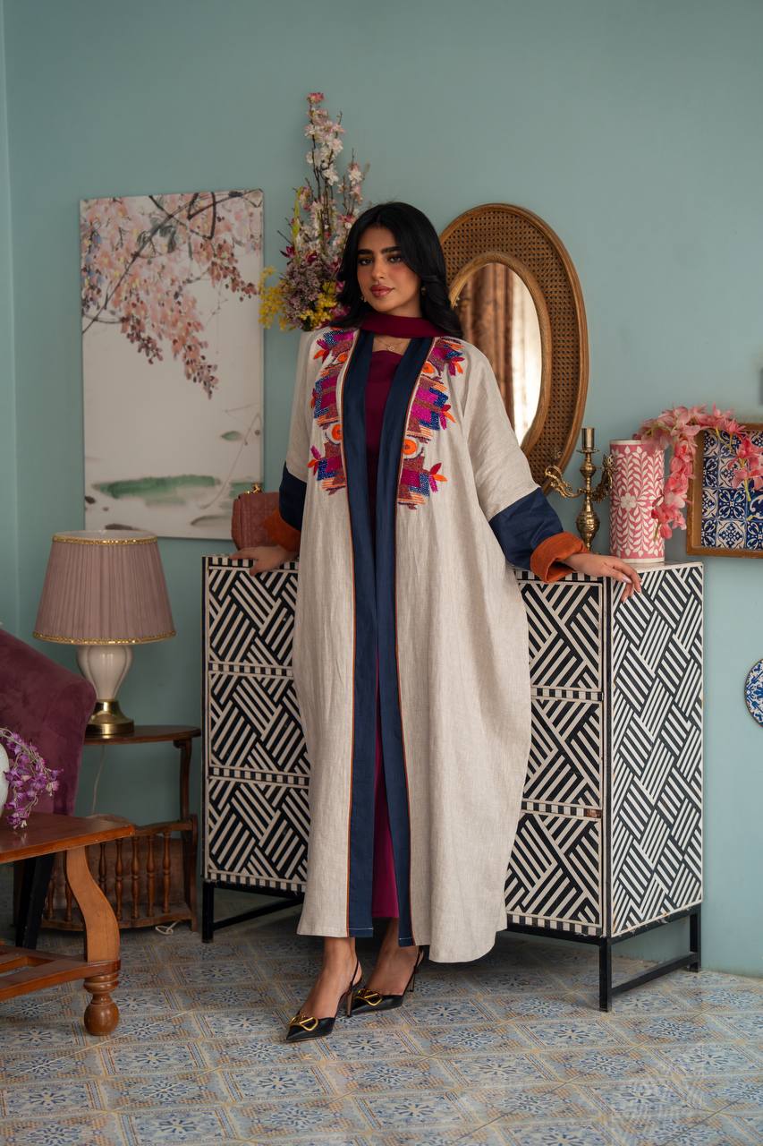 Light beige linen abaya with hand-beading. C:J1079