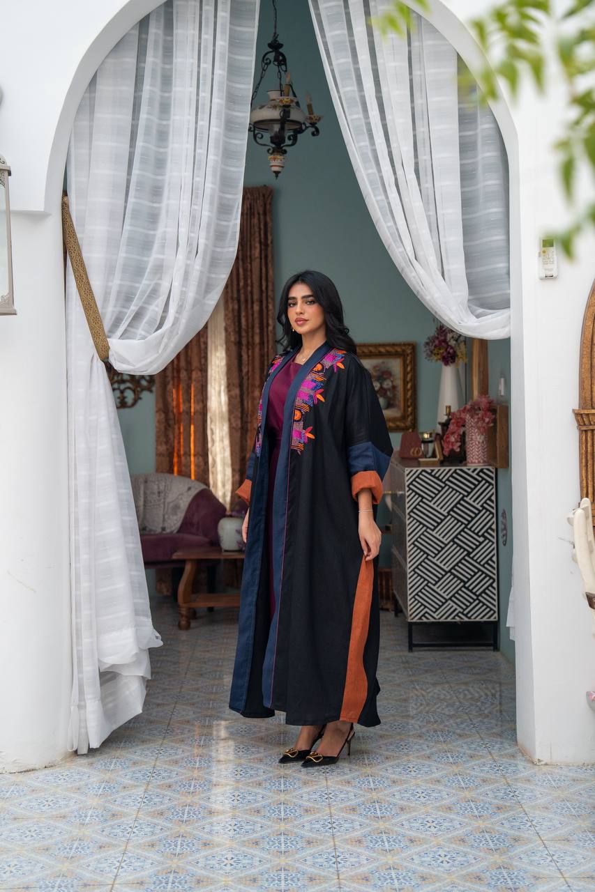Linen abaya in black with hand embroidery. C:J1080