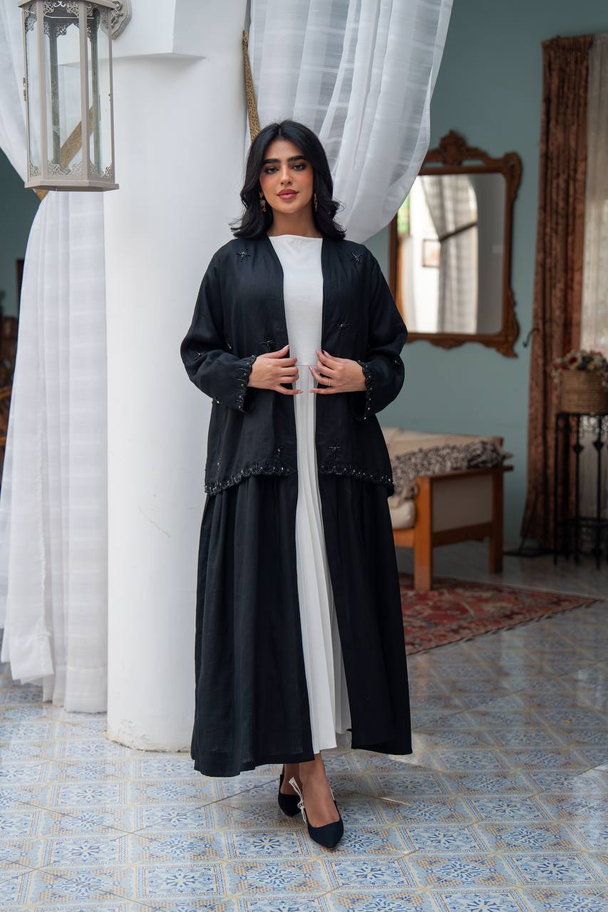 Trench coat linen in black with hand stitching.C:J1081/S