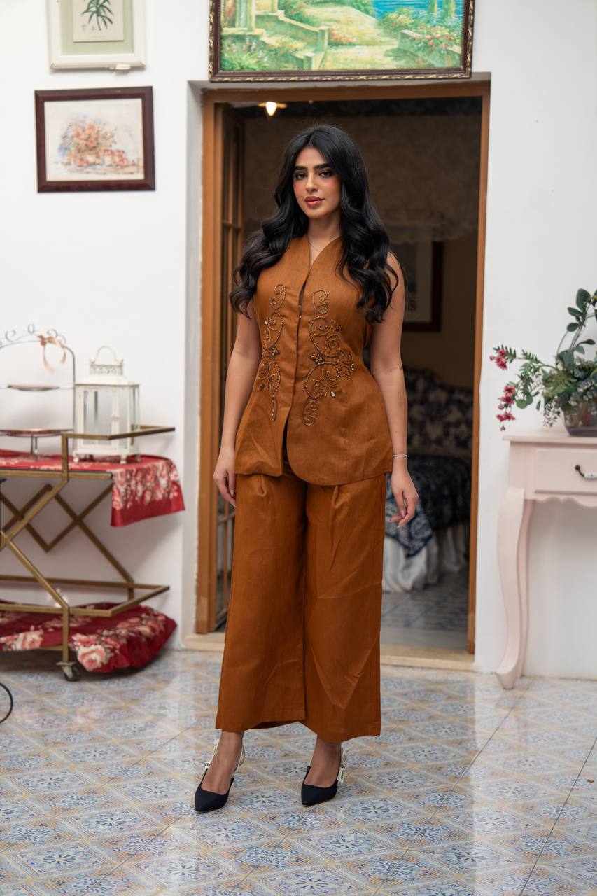 Vest and pants set in camel color with hand embroidery.C:J104