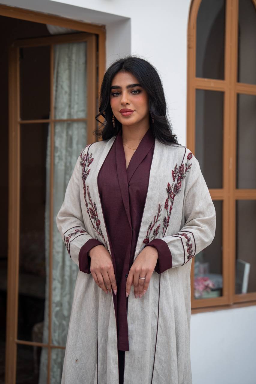 Light beige linen trench coat with embroidery.C:1091