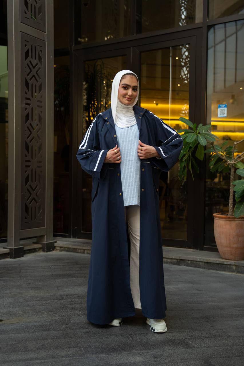 Navy blue trench coat.:1130