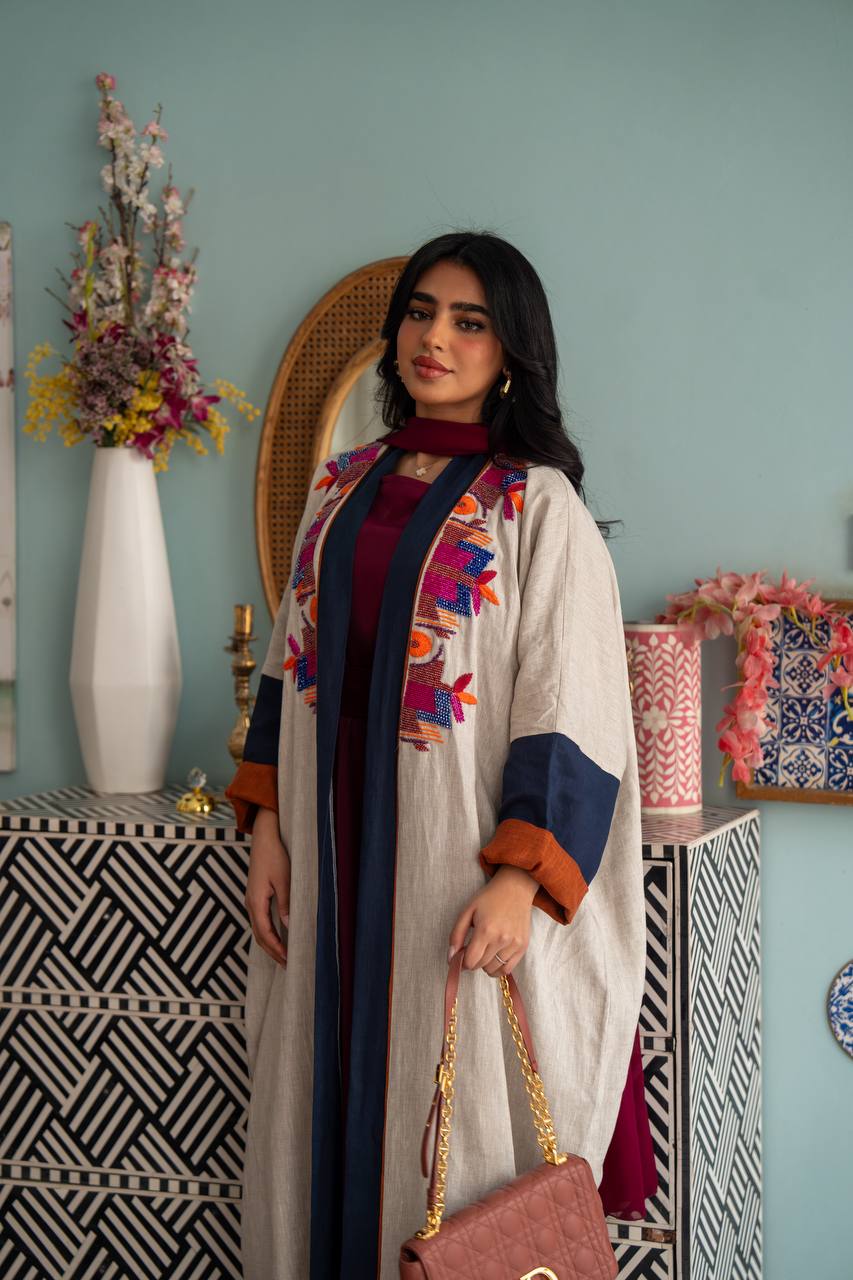 Light beige linen abaya with hand-beading. C:J1079