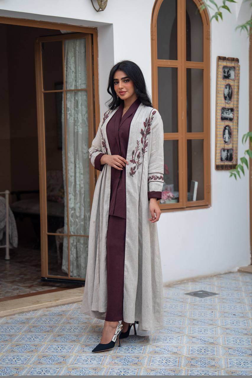 Light beige linen trench coat with embroidery.C:1091