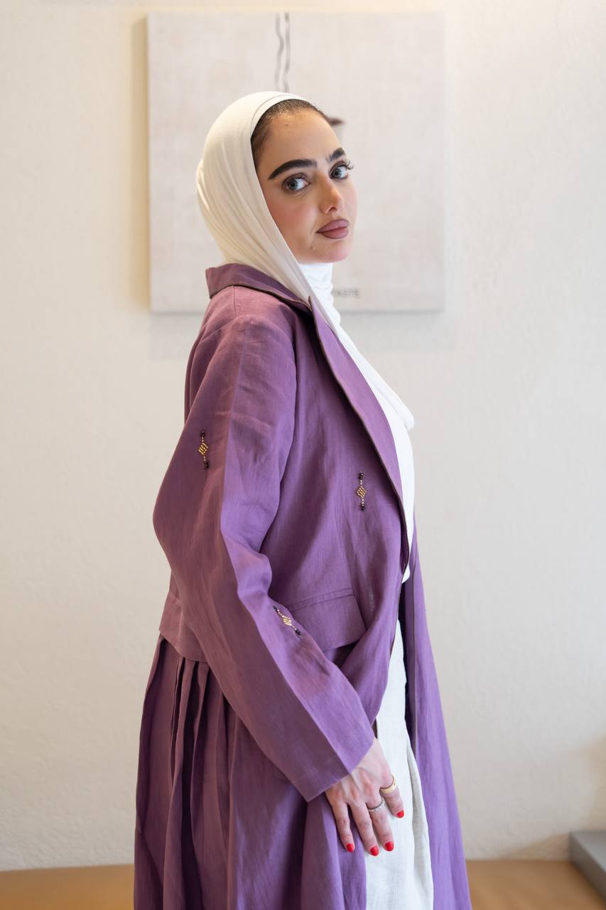 Purple linen trench coat with hand-stitched detailing.C:1096