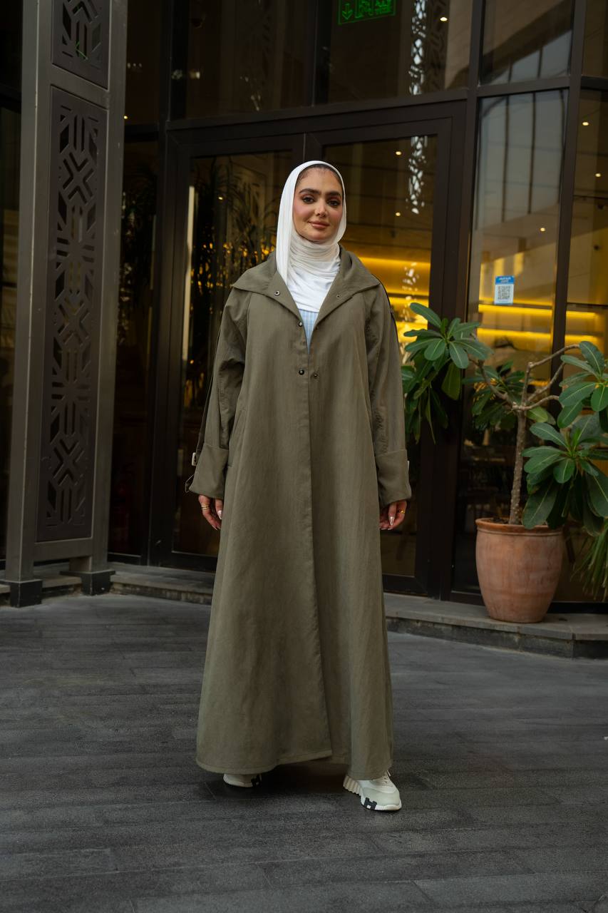 Olive green trench coat.C:1129