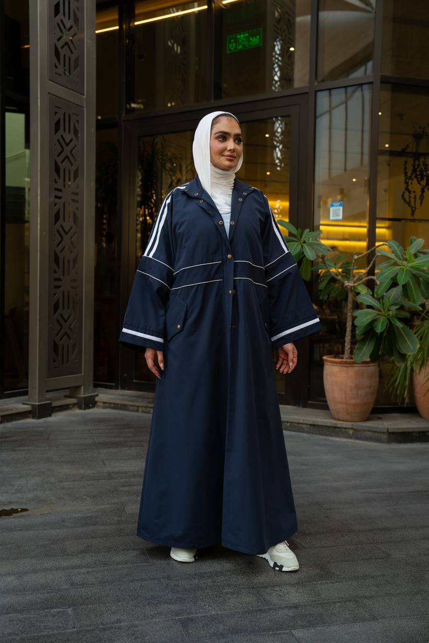 Navy blue trench coat.:1130
