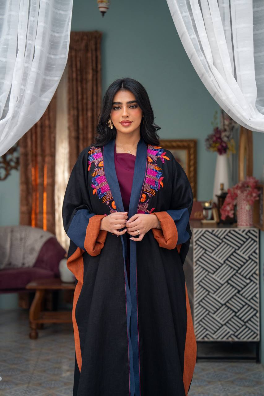 Linen abaya in black with hand embroidery. C:J1080