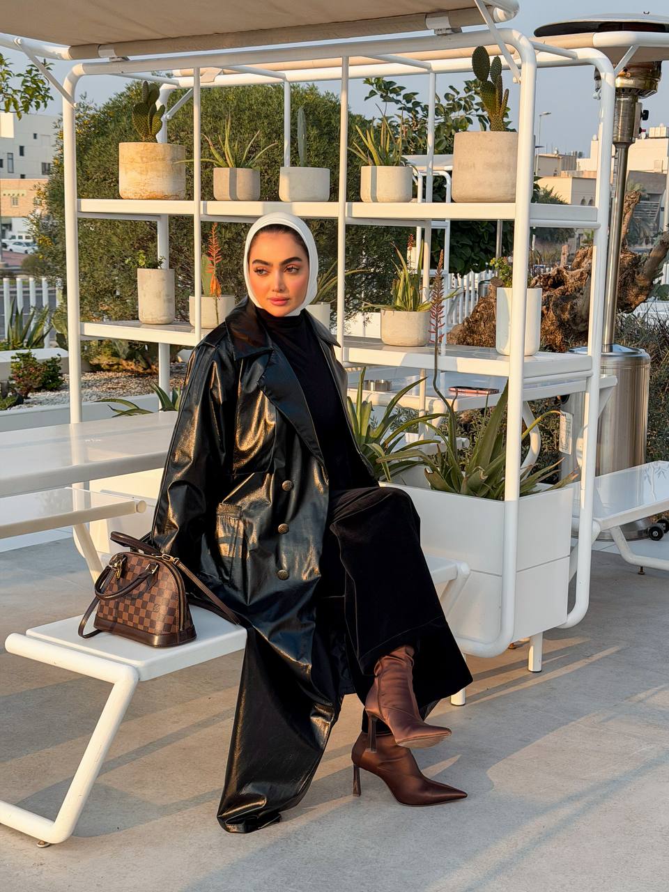 black leather trench coat. C:J1067