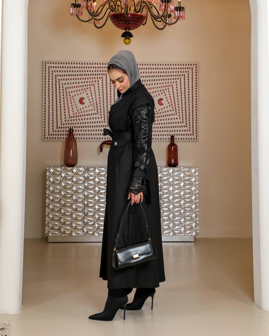 Trench coat with leather on the sleeves. C:J1075