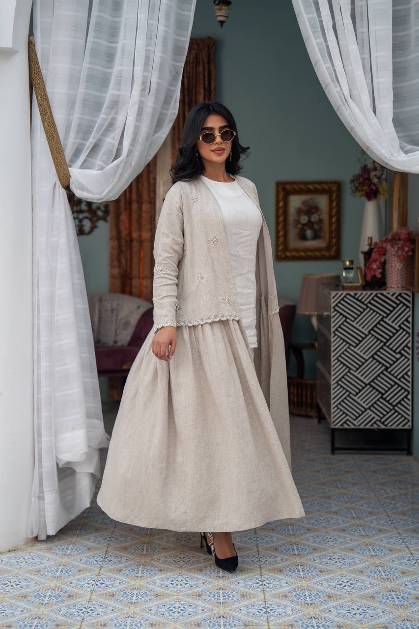 Light beige linen trench coat with hand-stitched detailing.C:J1081