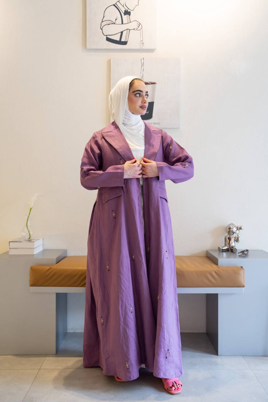 Purple linen trench coat with hand-stitched detailing.C:1096