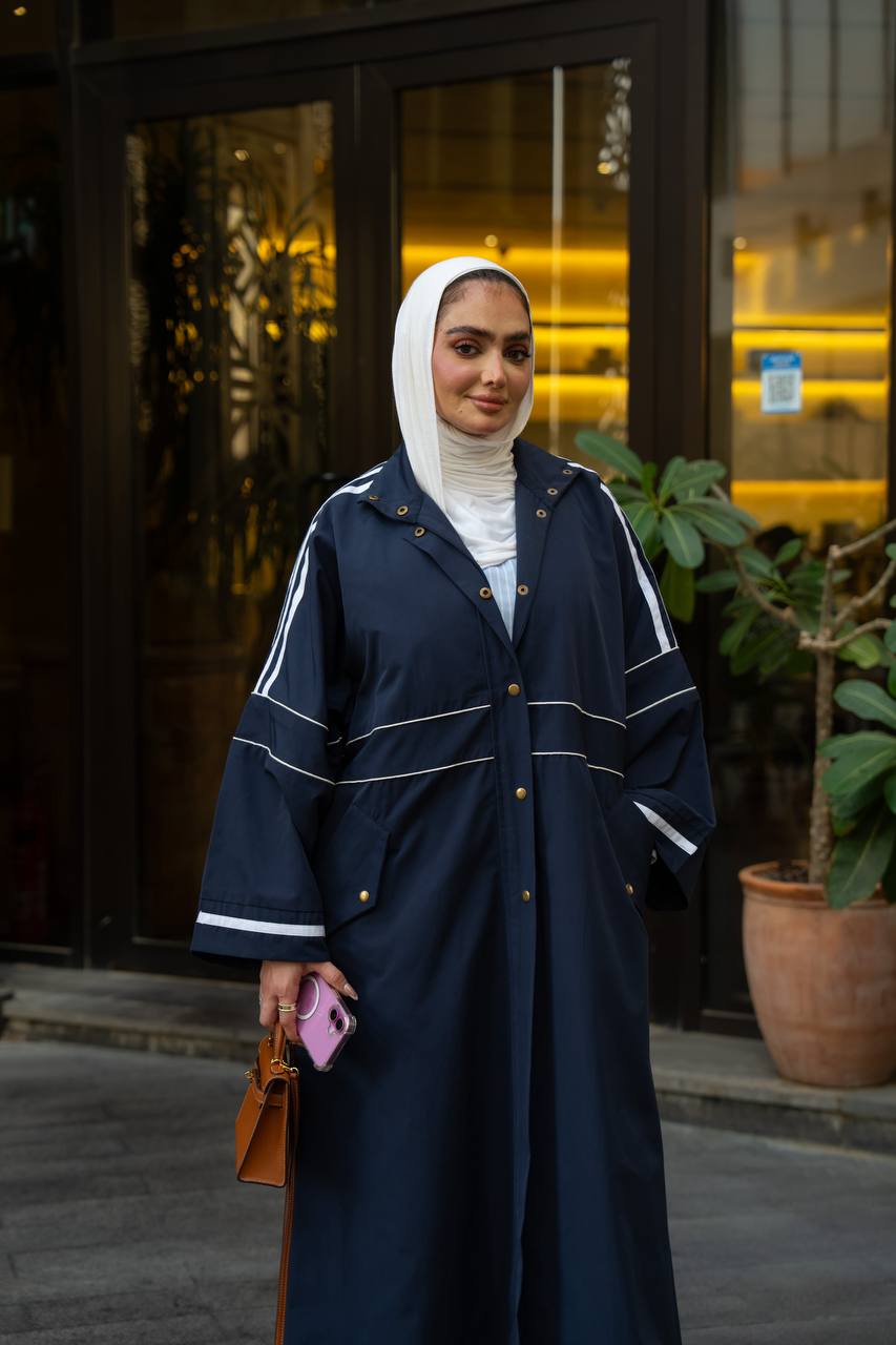 Navy blue trench coat.:1130