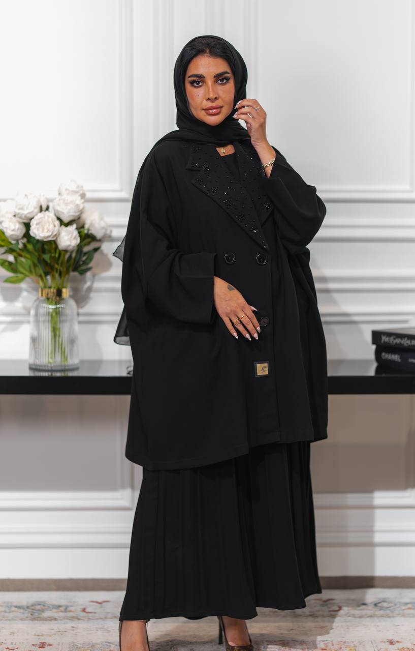 Black crepe skirt and blazer set.C:J6516
