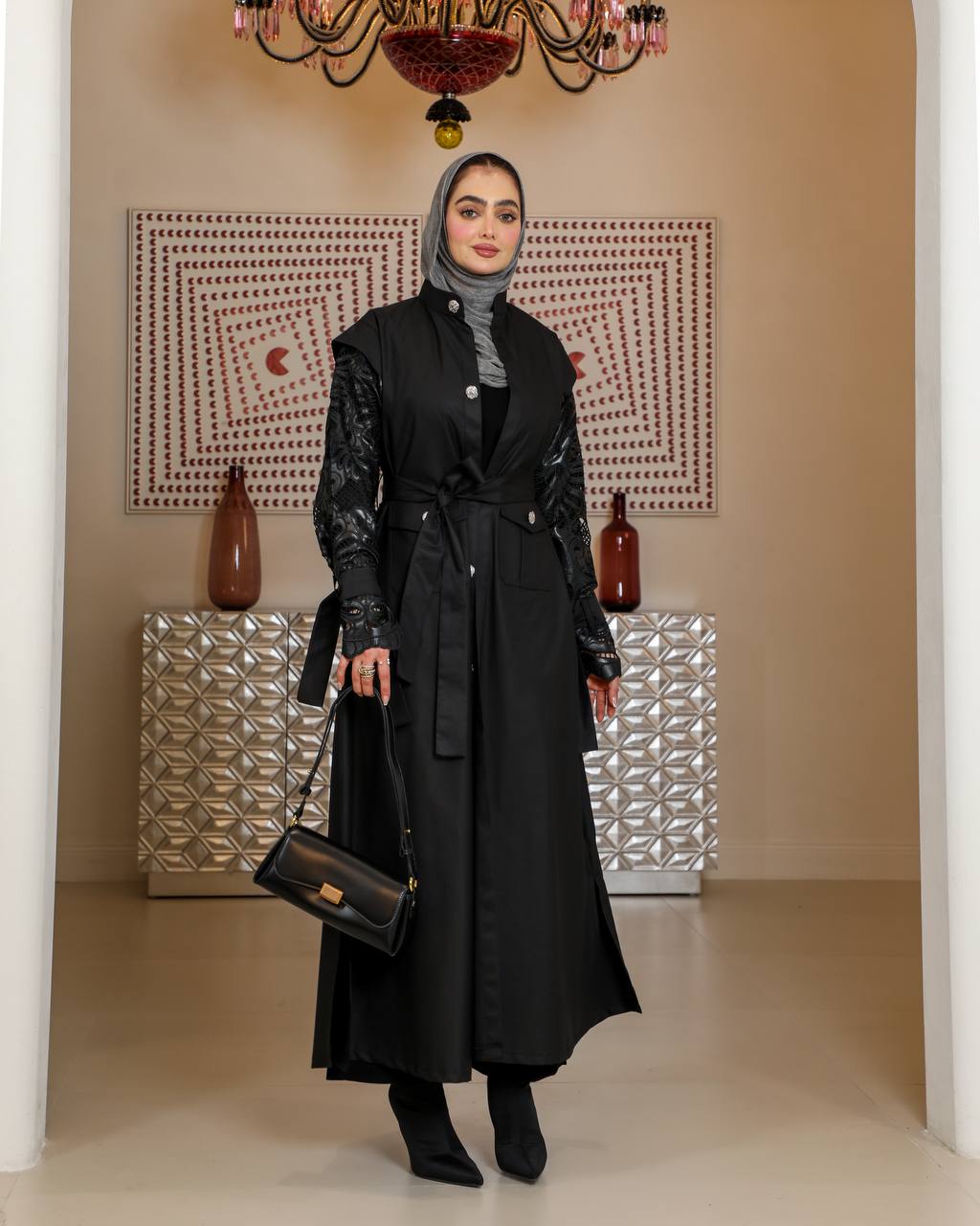 Trench coat with leather on the sleeves. C:J1075