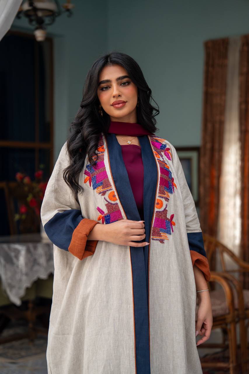 Light beige linen abaya with hand-beading. C:J1079