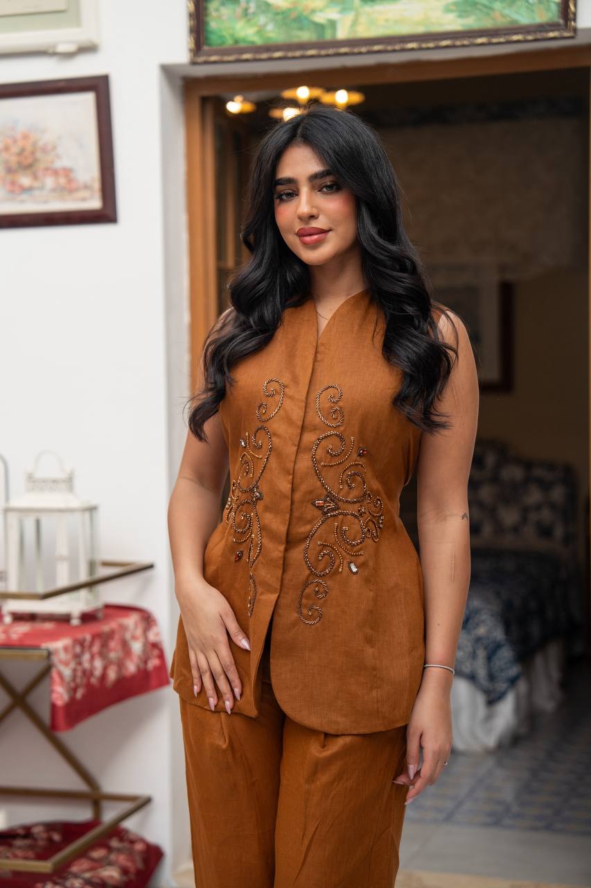 Vest and pants set in camel color with hand embroidery.C:J104