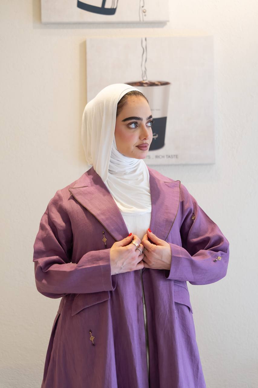 Purple linen trench coat with hand-stitched detailing.C:1096