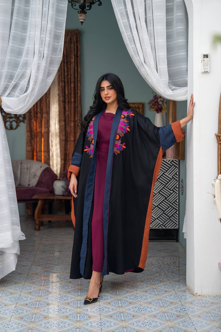 Linen abaya in black with hand embroidery. C:J1080