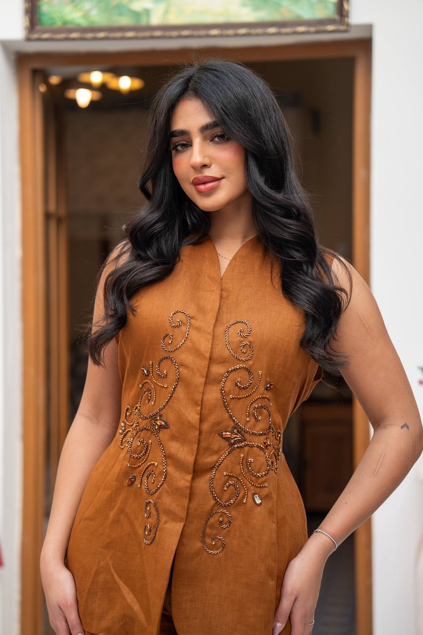 Vest and pants set in camel color with hand embroidery.C:J104