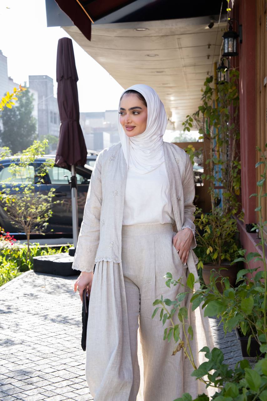 Light beige linen trench coat with hand-stitched detailing.C:J1081