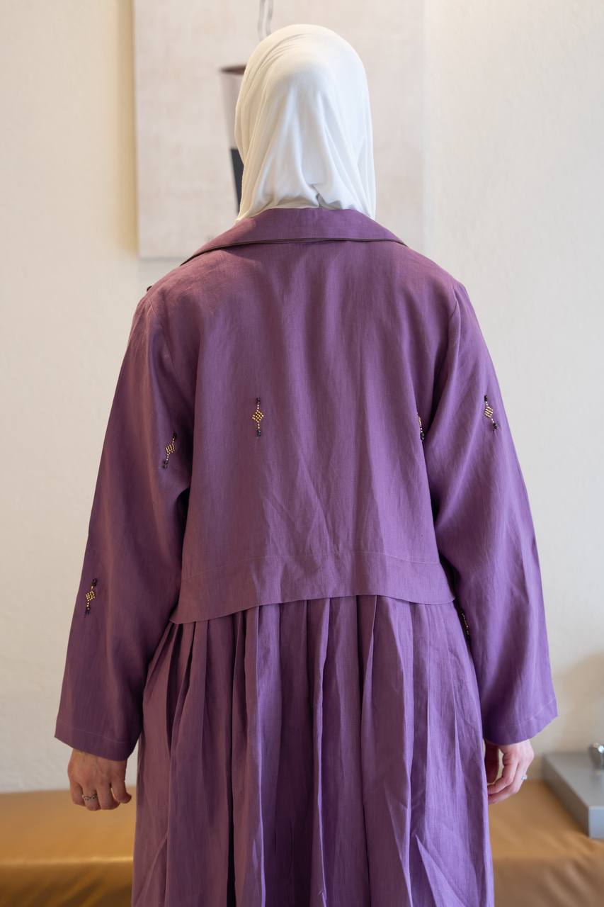 Purple linen trench coat with hand-stitched detailing.C:1096