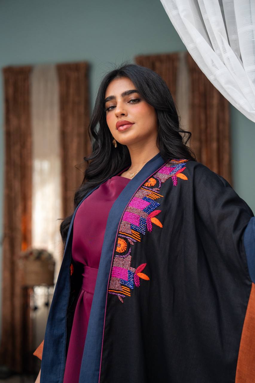 Linen abaya in black with hand embroidery. C:J1080