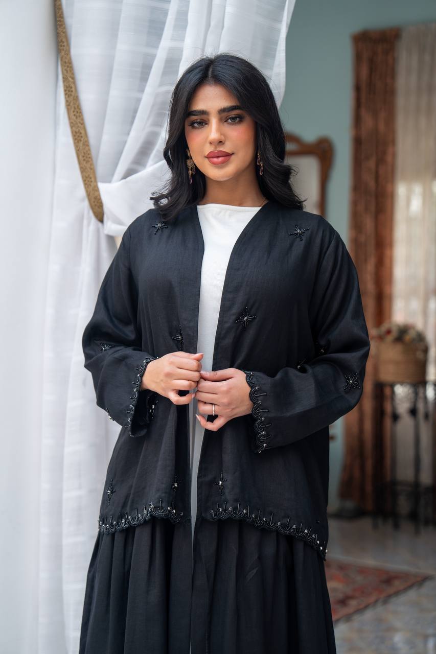 Trench coat linen in black with hand stitching.C:J1081/S