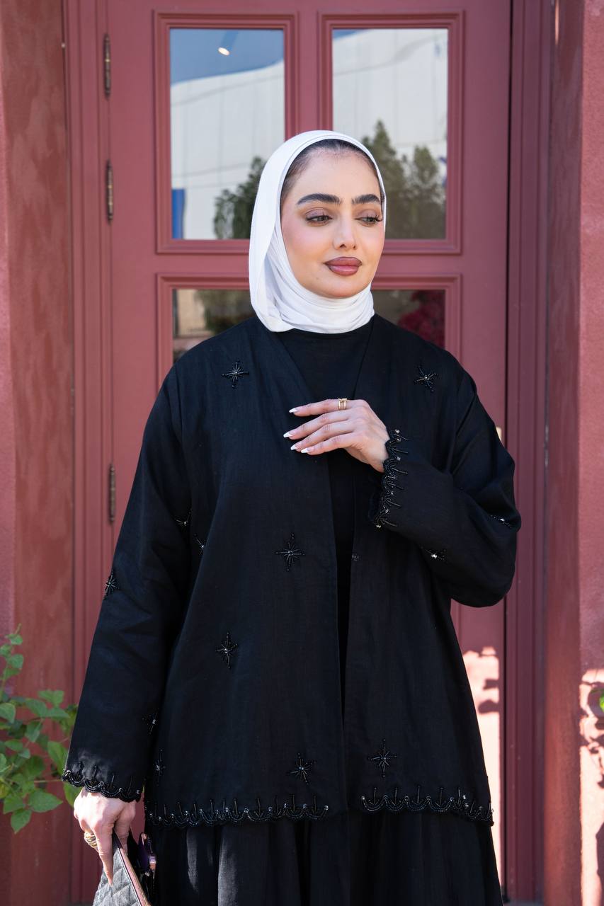 Trench coat linen in black with hand stitching.C:J1081/S